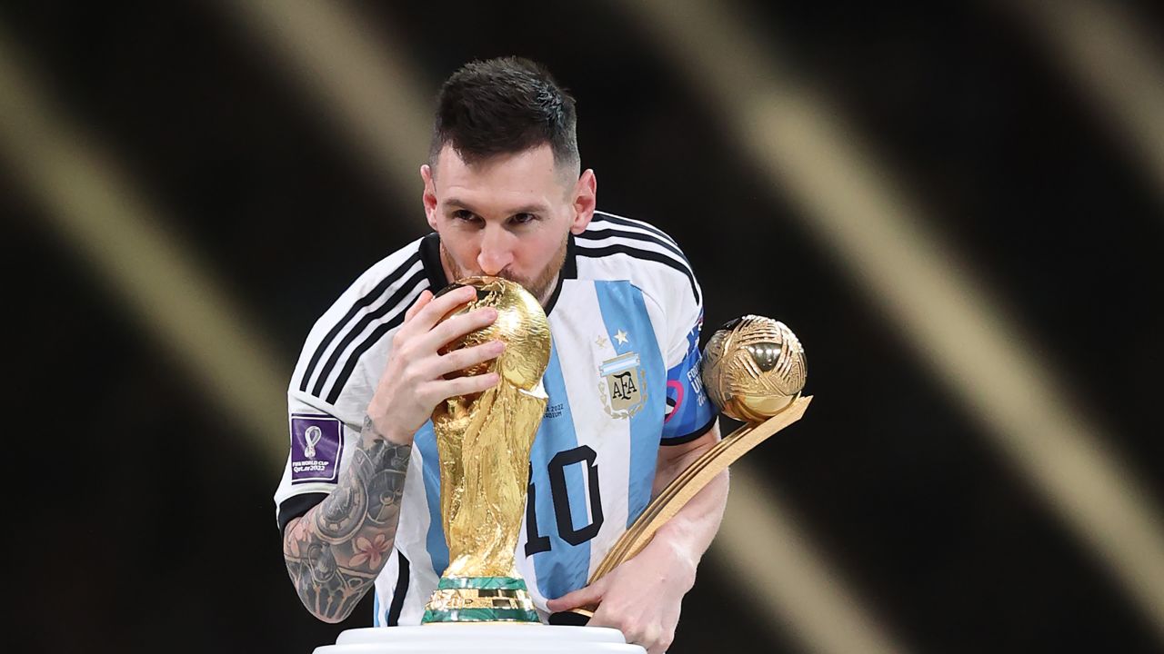 messi with both the world cup and golden ball